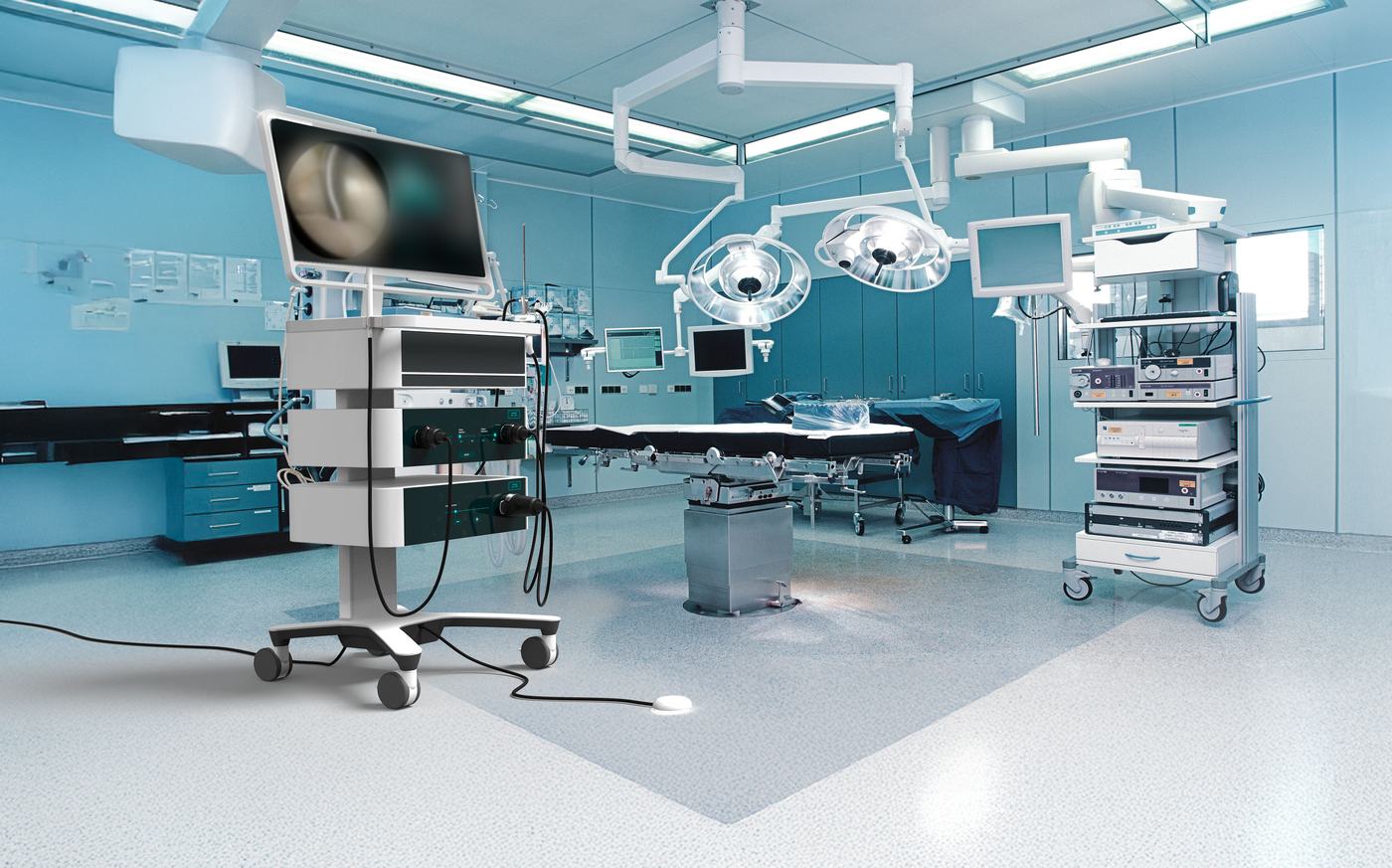 Concept visualisation of an operating room with a JED Explorer system cart beside the operating table
